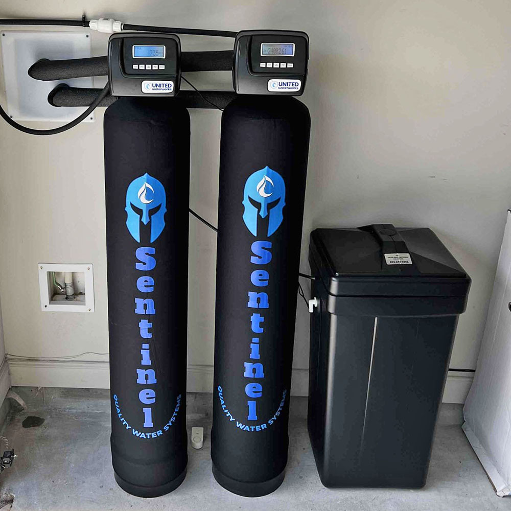 Sentinel Pro Water Softener installation in Katy, Texas front view showing twin valves.