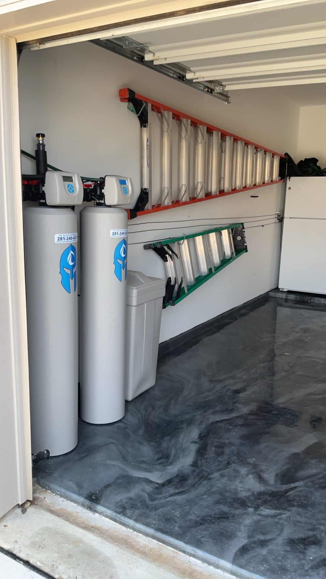 LeakSecure leak detection installed with a SENTINEL ELITE water treatment system in a Cypress Texas garage