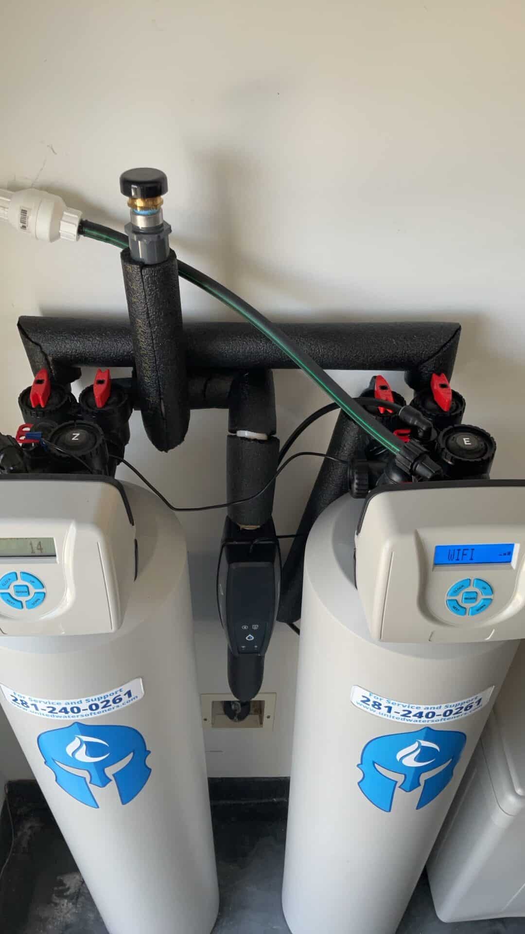 Whole home water softener and filtration tanks with WiFi-enabled control valves installed in Cypress Texas