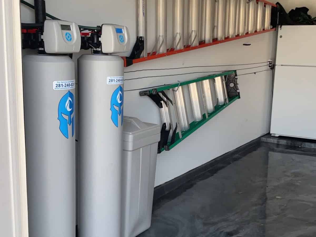 Whole-home water softener and filtration system installed in a Cypress, TX 77433 garage
